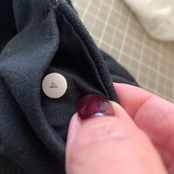 Two Lululemon for one price. One set of capris sz 6 and one set of tights, sz 4 - Picture 8 of 8